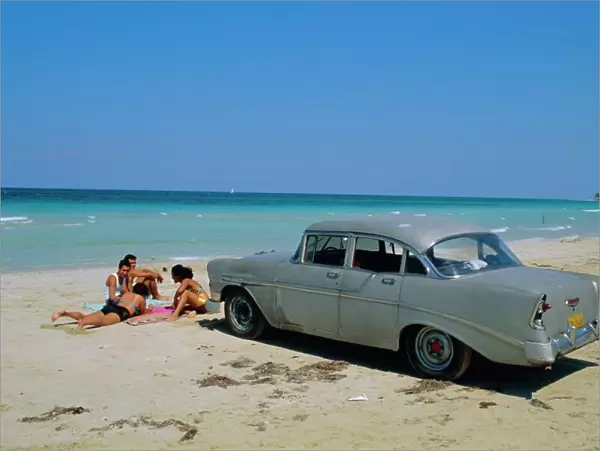 1950s American car on the beach, Goanabo, Cuba, Caribbean Sea, Central America