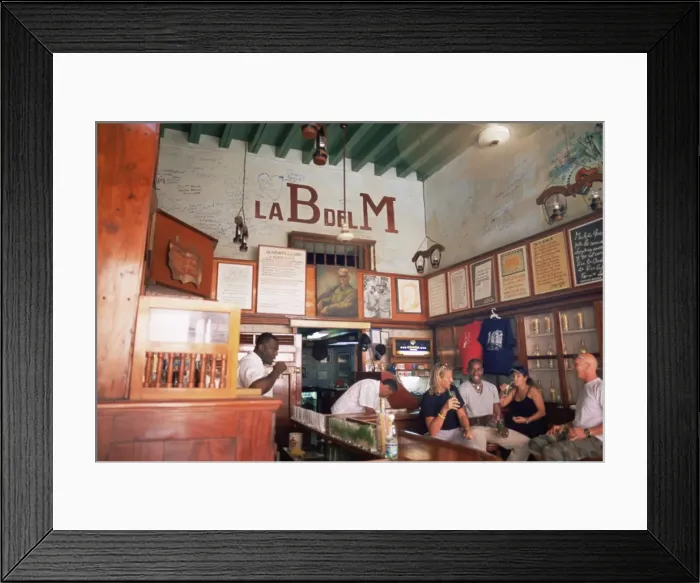 Framed Print : Tourists enjoy mojitos at the Bodegita del Medio, one of Havanas oldest bars Framed Print : Tourists enjoy mojitos at the Bodegita del Medio, one of Havanas oldest bars