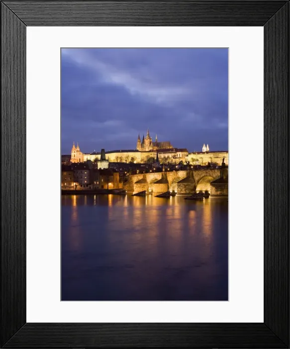 Framed Print : St. Vitus Cathedral, Charles Bridge and the Castle District illuminated at night in winter Framed Print : St. Vitus Cathedral, Charles Bridge and the Castle District illuminated at night in winter