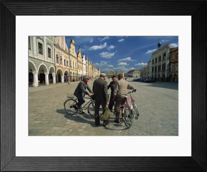 Framed Print : A group of elderly men talking in the 16th century town square in Telc Framed Print : A group of elderly men talking in the 16th century town square in Telc