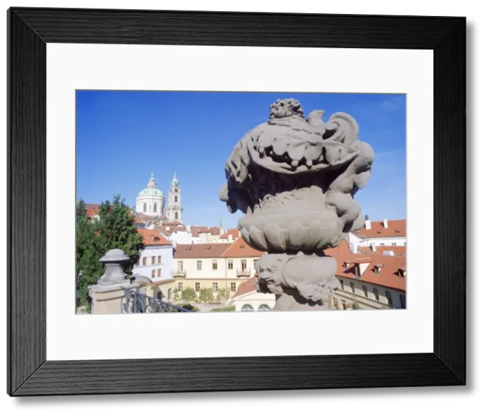 Framed Print : Baroque statue at Vrtbovska Garden with Baroque St. Nicholas Church in the background Framed Print : Baroque statue at Vrtbovska Garden with Baroque St. Nicholas Church in the background