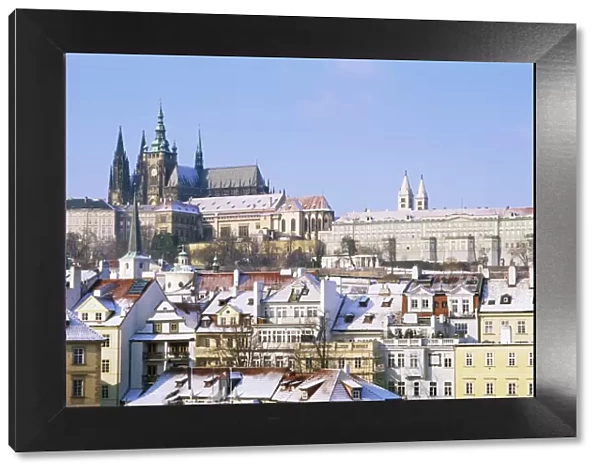 Prague Castle and houses of Mala Strana suburb in winter, Prague, Czech Republic, Europe