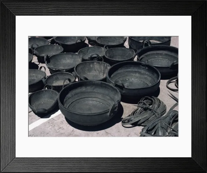 Framed Print : A selection of buckets made from recycled tyres for sale at Pujilo market in Ecuador Framed Print : A selection of buckets made from recycled tyres for sale at Pujilo market in Ecuador