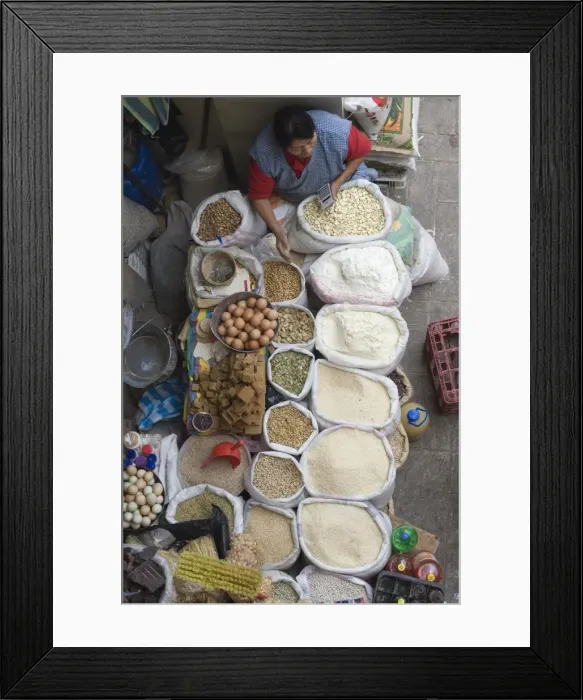 Framed Print : Woman selling eggs, rice, flour, pulses, pumpkin seeds and other dried goods in the modern 10th de Agosto market on Calle Larga, Cuenca, Azuay Province, Southern Highlands, Ecuador Framed Print : Woman selling eggs, rice, flour, pulses, pumpkin seeds and other dried goods in the modern 10th de Agosto market on Calle Larga, Cuenca, Azuay Province, Southern Highlands, Ecuador