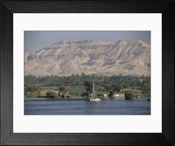 Framed Print : Felucca on the River Nile, looking towards Valley of the Kings, Luxor, Thebes Framed Print : Felucca on the River Nile, looking towards Valley of the Kings, Luxor, Thebes
