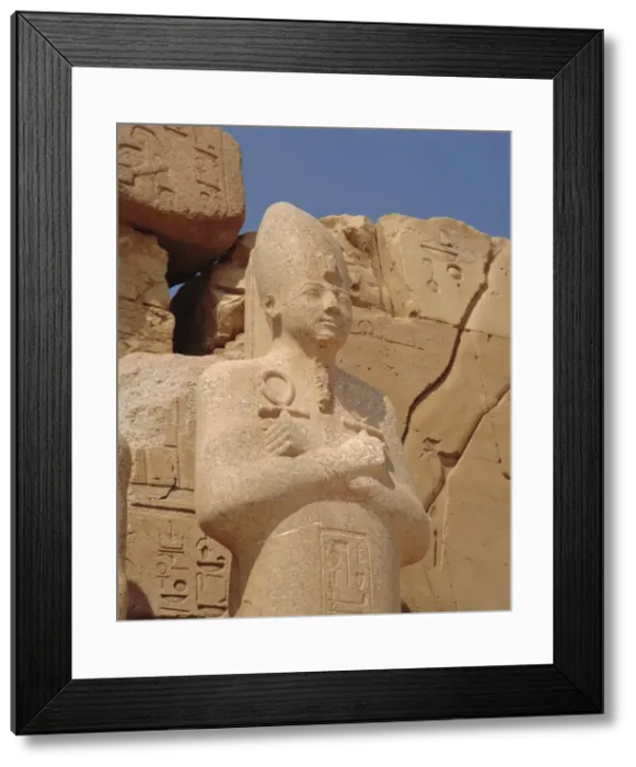 Framed Print : Statue of middle kingdom pharoah, Karnak Temple, Luxor, Egypt Framed Print : Statue of middle kingdom pharoah, Karnak Temple, Luxor, Egypt
