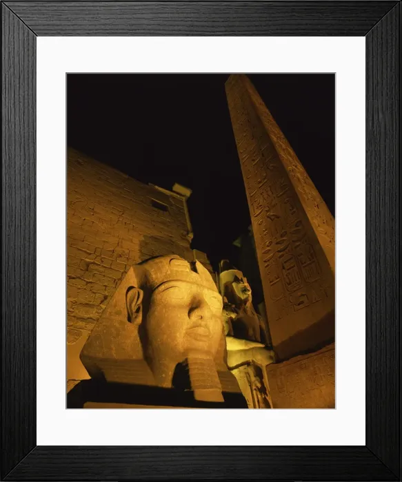 Framed Print : Ramses II and the Obelisk at Luxor Temple, illuminated at night, Luxor Framed Print : Ramses II and the Obelisk at Luxor Temple, illuminated at night, Luxor