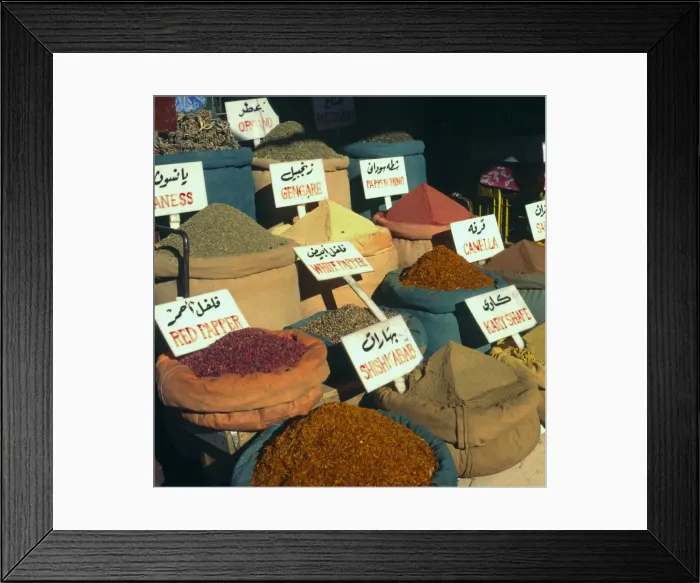 Framed Print : Close up of pyramids of loose spices for sale in local market, Aswan, Egypt Framed Print : Close up of pyramids of loose spices for sale in local market, Aswan, Egypt