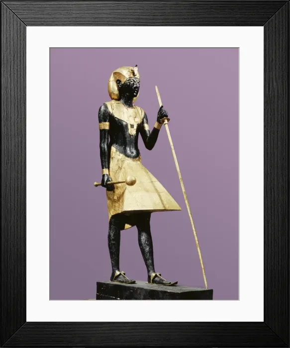 Framed Print : Life size statue of Tutankhamun made from black wood with applied gilded plaster