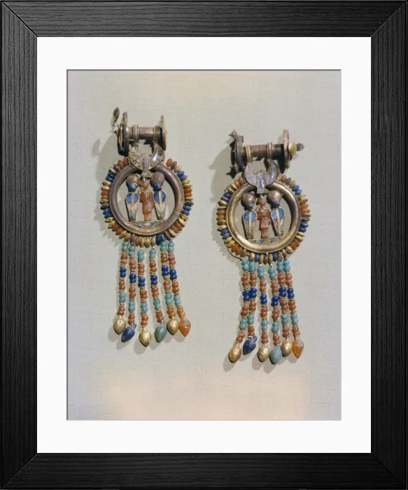 Framed Print : Earrings which show the king flanked by two sacred serpents in the centre of the clip Framed Print : Earrings which show the king flanked by two sacred serpents in the centre of the clip