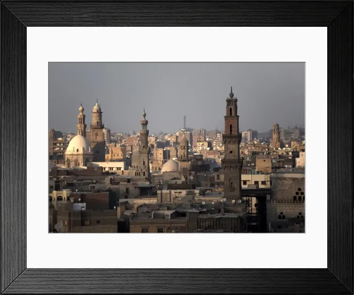 Framed Print : Minarets tower over Islamic Cairo and the area of Khan al-Khalili, Cairo Framed Print : Minarets tower over Islamic Cairo and the area of Khan al-Khalili, Cairo
