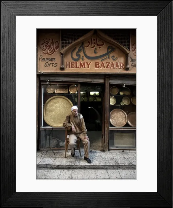 Framed Print : Shop owner relaxes in the great bazaar of Khan al-Khalili, Cairo, Egypt, Africa Framed Print : Shop owner relaxes in the great bazaar of Khan al-Khalili, Cairo, Egypt, Africa