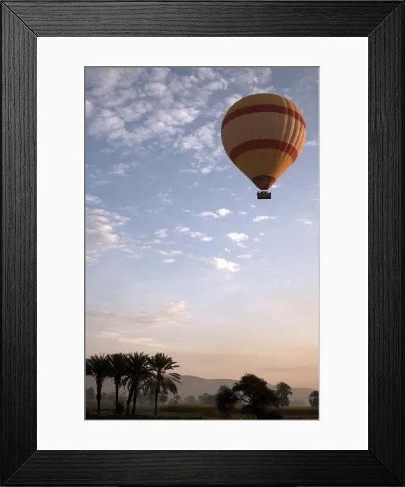 Framed Print : Hot air balloons carry tourists on early morning flights over the Valley of the Kings Framed Print : Hot air balloons carry tourists on early morning flights over the Valley of the Kings