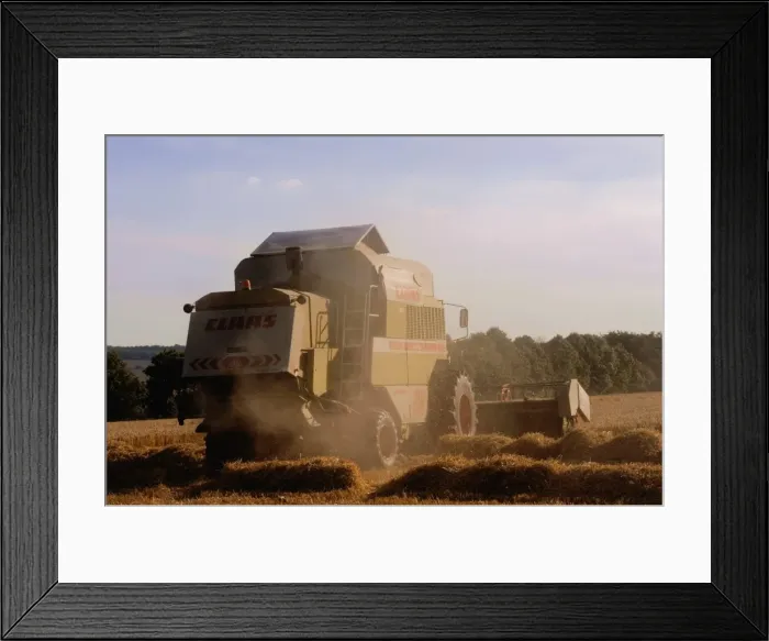 Framed Print : Combine harvester baling hay, seen from the Cotswolds Way footpath, The Coltswolds Framed Print : Combine harvester baling hay, seen from the Cotswolds Way footpath, The Coltswolds
