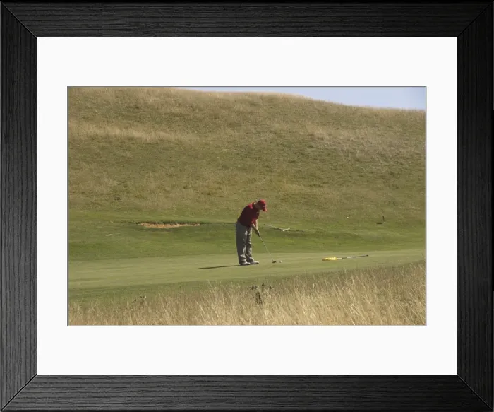 Framed Print : Golfer putting on public golf course, Cleeve Hill, The Cotswolds, Gloucestershire Framed Print : Golfer putting on public golf course, Cleeve Hill, The Cotswolds, Gloucestershire