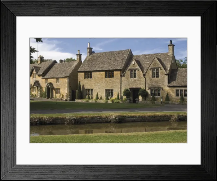 Framed Print : Stone cottages along the banks of the River Eye, Lower Slaughter, The Cotswolds Framed Print : Stone cottages along the banks of the River Eye, Lower Slaughter, The Cotswolds