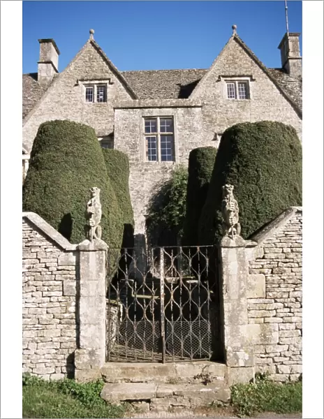 Cotswold house, topiary and gate, Ablington, Gloucestershire, The Cotswolds