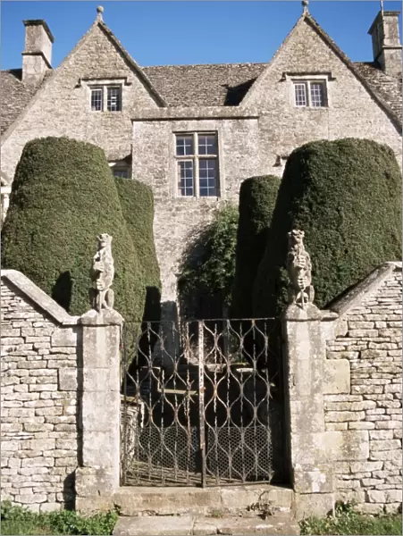 Cotswold house, topiary and gate, Ablington, Gloucestershire, The Cotswolds
