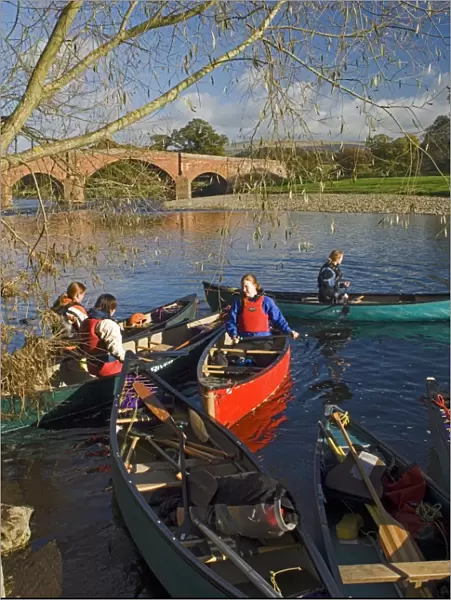 Canoeists on the River Eden at Eden Bridge, Lazonby, Eden Valley, Cumbria