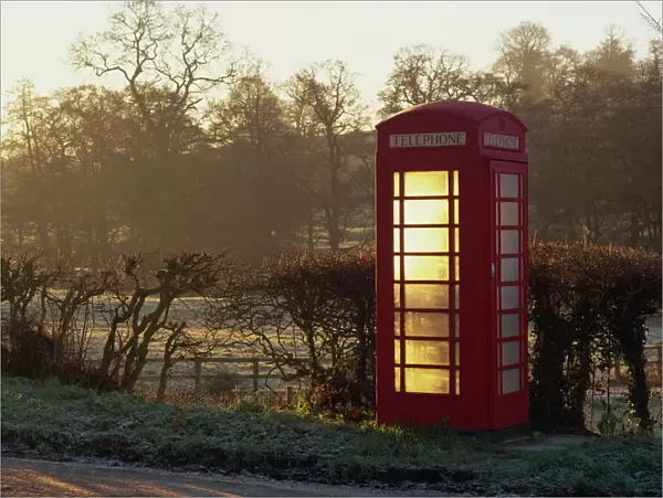 Red telephone box, on a frosty morning in early light, Snelston, Hartington