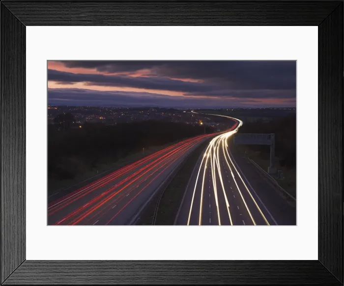 Framed Print : Traffic light trails in the evening on the M1 motorway near junction 28 Framed Print : Traffic light trails in the evening on the M1 motorway near junction 28