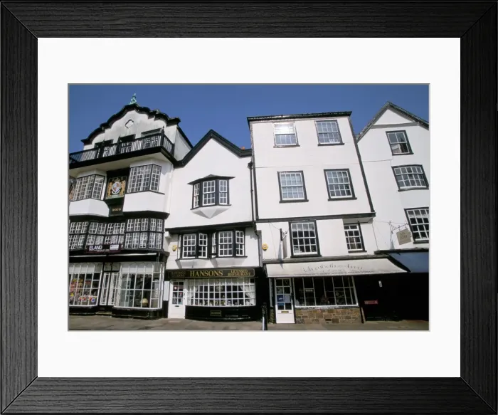Framed Print : Shops in Tudor buildings, Cathedral Green, Exeter, Devon, England, United Kingdom, Europe Framed Print : Shops in Tudor buildings, Cathedral Green, Exeter, Devon, England, United Kingdom, Europe