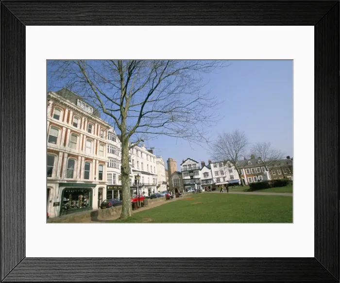 Framed Print : Shops and restaurants, Cathedral Green, Exeter, Devon, England, United Kingdom, Europe Framed Print : Shops and restaurants, Cathedral Green, Exeter, Devon, England, United Kingdom, Europe