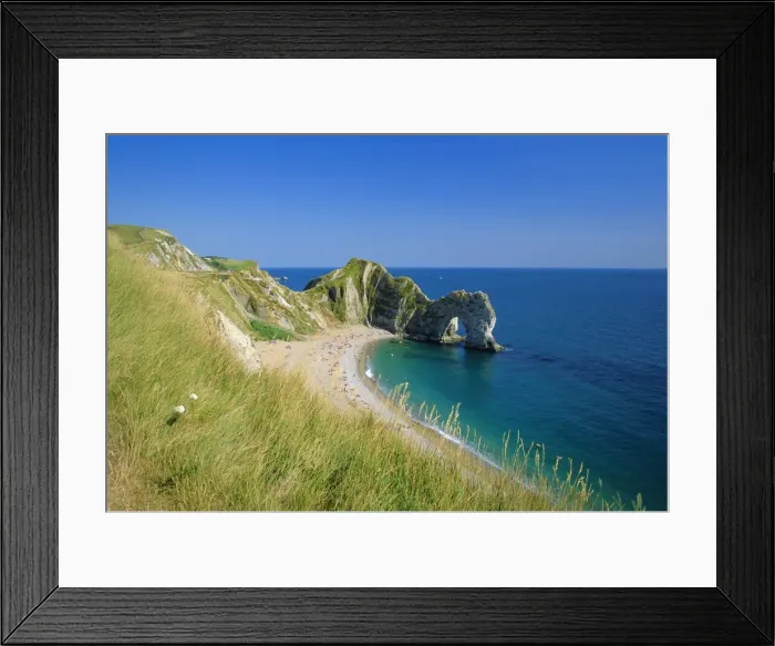 Framed Print : View from coastal path of Durdle Door, arch of Purbeck limestone, near West Lulworth Framed Print : View from coastal path of Durdle Door, arch of Purbeck limestone, near West Lulworth
