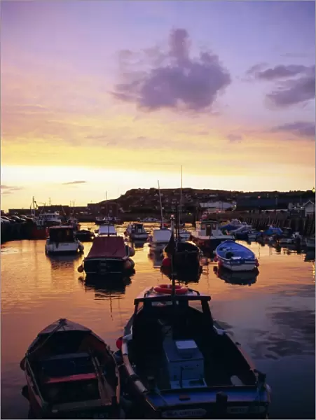 Harbour at sunset, West Bay, Dorset, England, UK, Europe