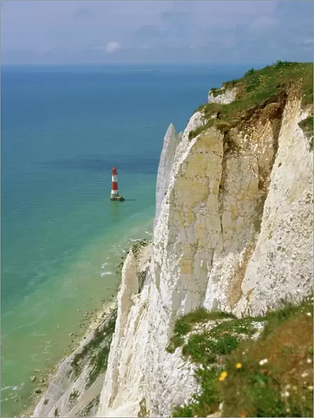 Lighthouse and chalk cliffs at Beachy Head, near Eastbourne, East Sussex, England, UK