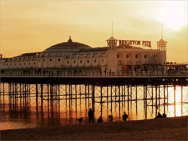 Brighton Pier at sunset, Brighton, East Sussex, England, United Kingdom, Europe