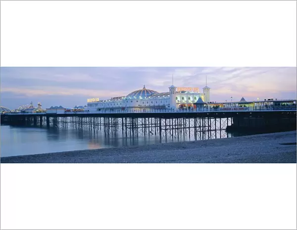 The beach and Palace Pier, Brighton, East Sussex, England, UK, Europe