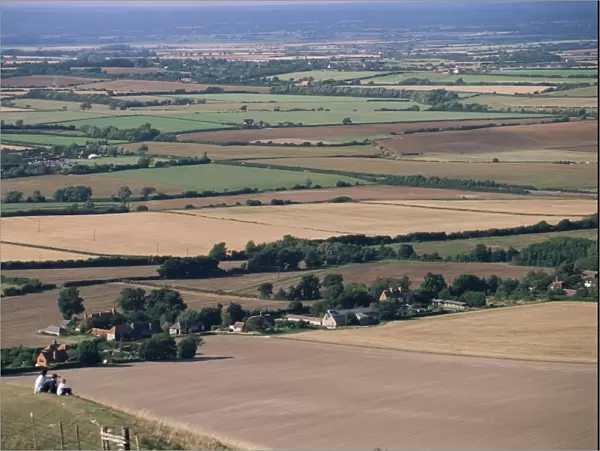 View across fields from the South Downs near Wilmington, East Sussex, England