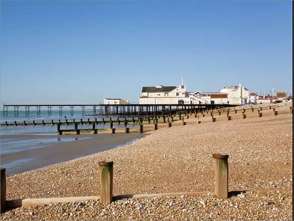 Deserted pebble beach at low tide and pier from east side, Bognor Regis
