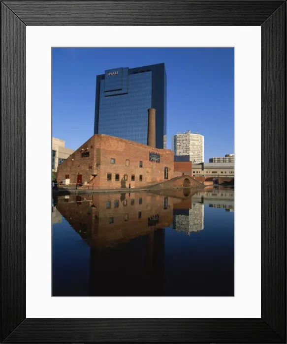 Framed Print : Architectural contrast between the Glass Works and the Hyatt Hotel behind Framed Print : Architectural contrast between the Glass Works and the Hyatt Hotel behind