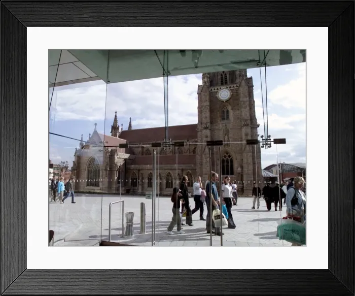 Framed Print : St. Martins in the Field church visible through glass window of shopping complex Framed Print : St. Martins in the Field church visible through glass window of shopping complex