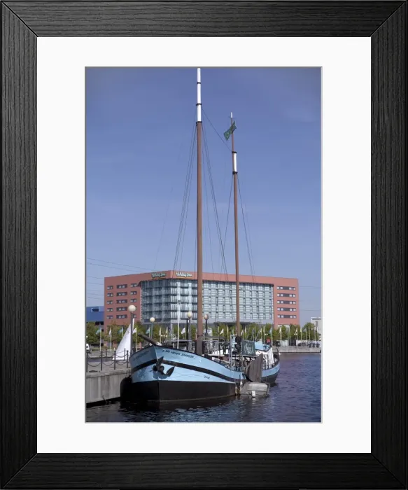 Framed Print : Preserved sailing ship Sir Henry Johnson, Holiday Inn beyond, Royal Victoria Dock Framed Print : Preserved sailing ship Sir Henry Johnson, Holiday Inn beyond, Royal Victoria Dock