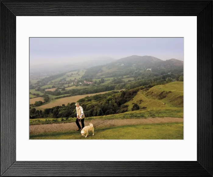 Framed Print : Woman taking dog for a walk, British Camp, Hereford Beacon, Malvern Hills Framed Print : Woman taking dog for a walk, British Camp, Hereford Beacon, Malvern Hills