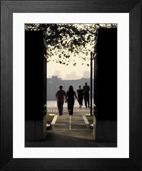 Framed Print : Two couples on Canary riverside walk alongside River Thames, Canary Wharf Framed Print : Two couples on Canary riverside walk alongside River Thames, Canary Wharf