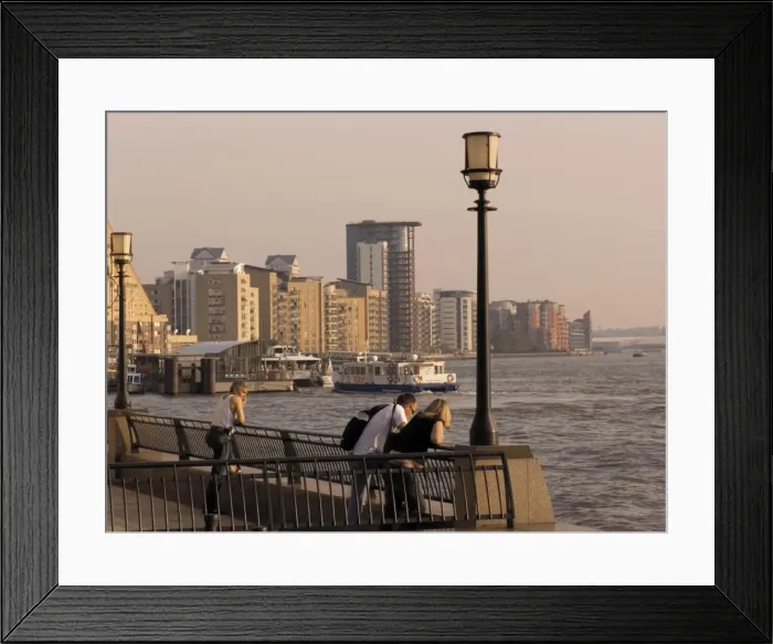 Framed Print : People looking at River Thames, with modern riverside flats beyond, the Canary riverside walk Framed Print : People looking at River Thames, with modern riverside flats beyond, the Canary riverside walk
