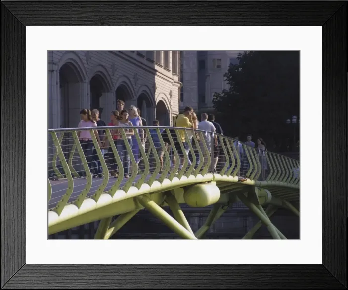 Framed Print : People on footbridge over West India Dock, Canary Wharf, Docklands, London Framed Print : People on footbridge over West India Dock, Canary Wharf, Docklands, London