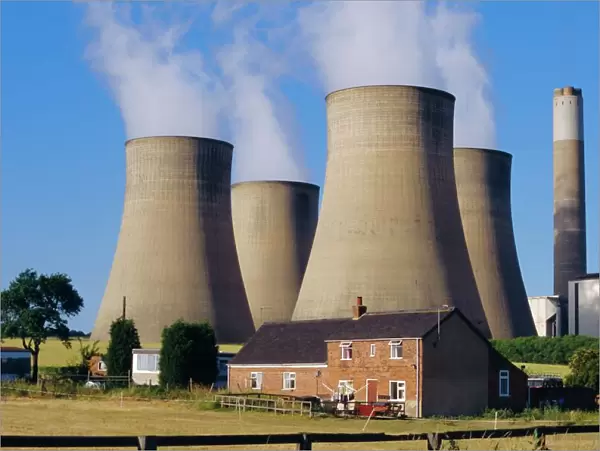 Cooling towers, Radcliffe on Soar Power Station, domestic housing in foreground