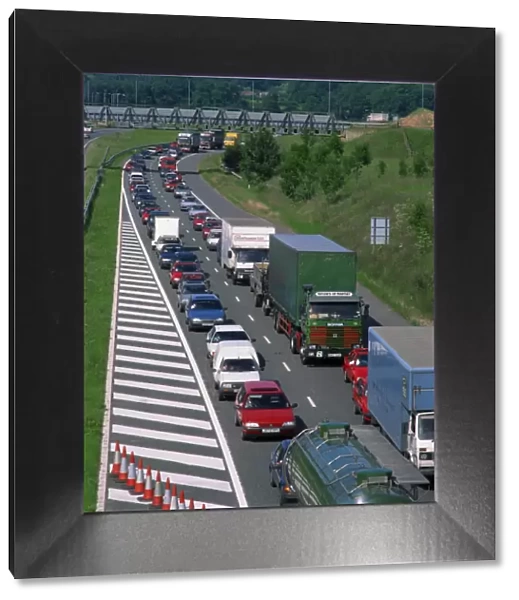 Lorries, vans and cars in a traffic jam on a road in England, United Kingdom, Europe