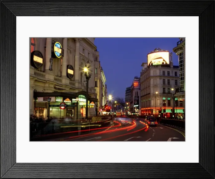 Framed Print : Traffic trails and theatre signs at night near Piccadilly Circus, London Framed Print : Traffic trails and theatre signs at night near Piccadilly Circus, London