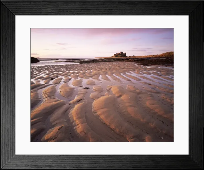 Framed Print : Bamburgh castle and Bamburgh beach at sunrise, Bamburgh, Northumberland Framed Print : Bamburgh castle and Bamburgh beach at sunrise, Bamburgh, Northumberland
