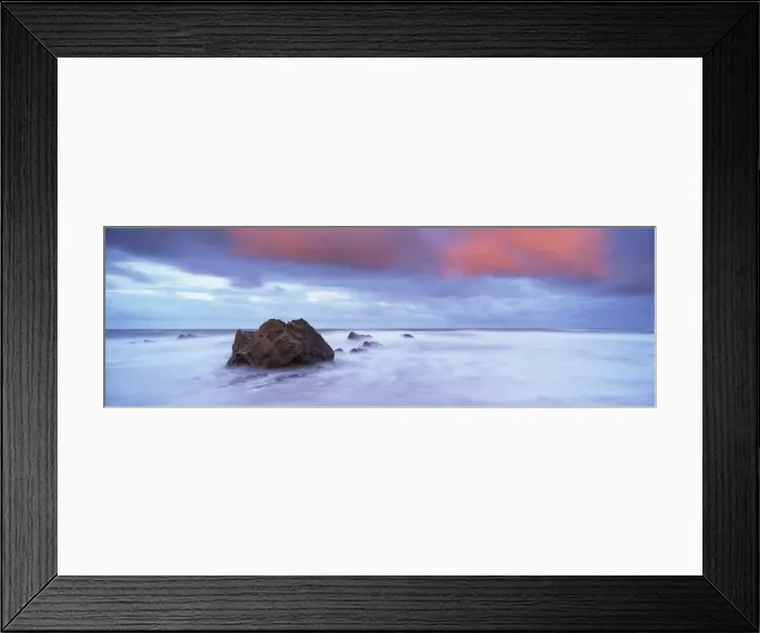 Framed Print : Widemouth Bay at sunrise, with offshore rocks and red storm clouds overhead Framed Print : Widemouth Bay at sunrise, with offshore rocks and red storm clouds overhead