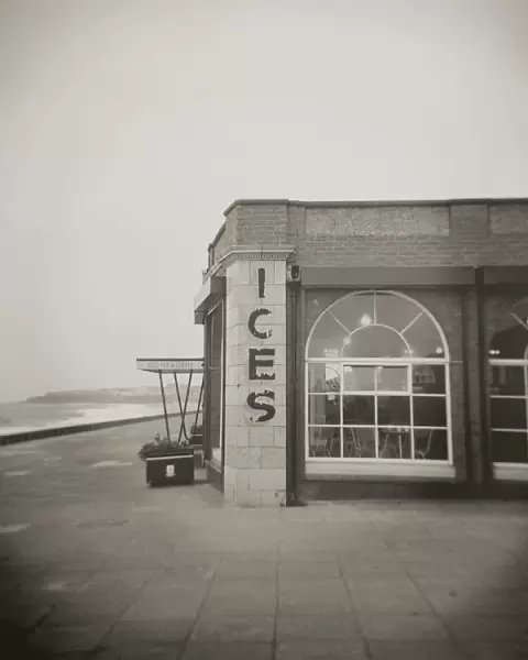 Image taken with a Holga medium format 120 film toy camera of ices sign on side of old Rendezvous Cafe on dull winters day, Whitley Bay, Tyne & Wear, England, United