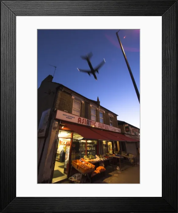 Framed Print : Aeroplane above shop, Hounslow, Greater London, England, United Kingdom, Europe Framed Print : Aeroplane above shop, Hounslow, Greater London, England, United Kingdom, Europe