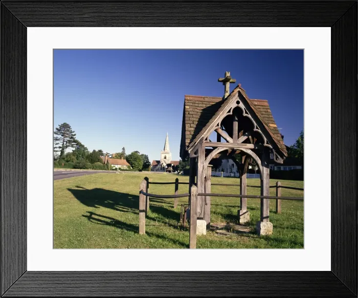 Framed Print : Pump, village green and church in the distance, Brockham, near Dorking Framed Print : Pump, village green and church in the distance, Brockham, near Dorking
