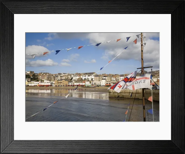 Framed Print : England flag on boat mast in South Bay, with South Sands beach and seafront beyond Framed Print : England flag on boat mast in South Bay, with South Sands beach and seafront beyond